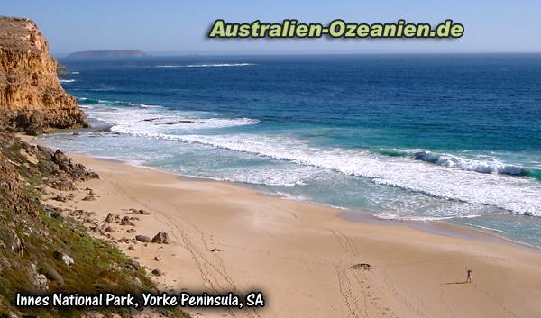 Person am weiten Strand